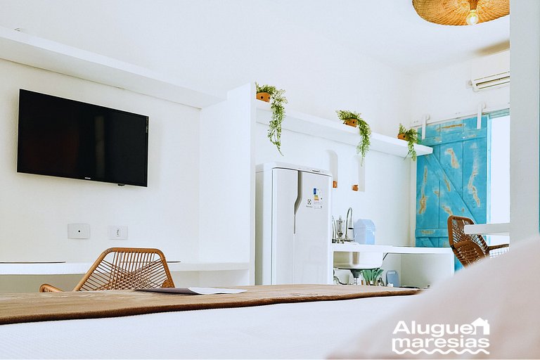 Studio com Roupa de Cama e Banho