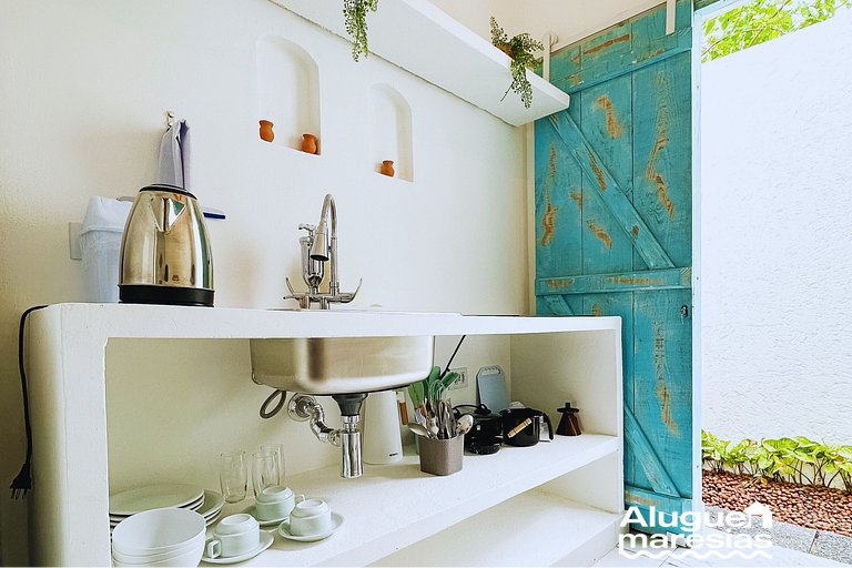 Estudio con ropa de cama y baño